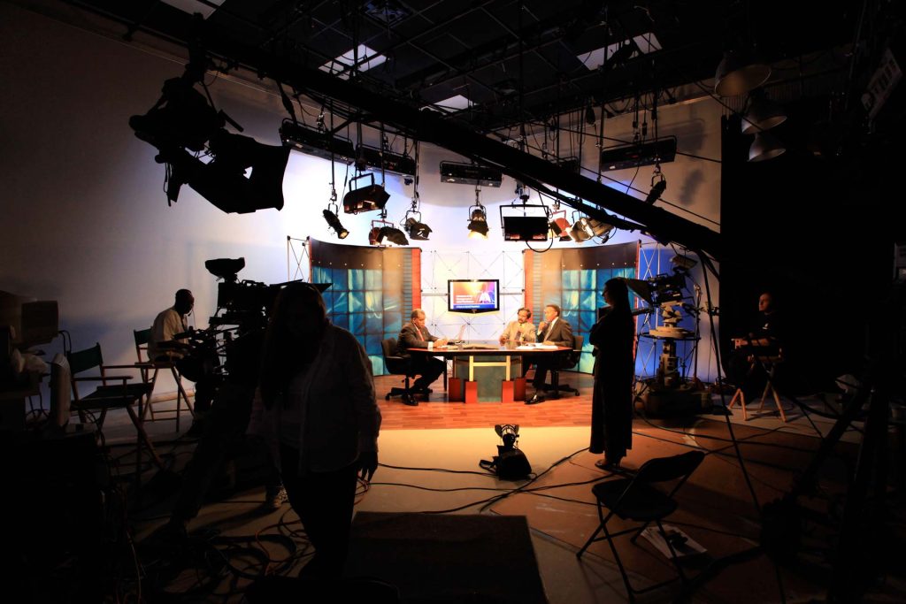 Behind the scenes television studio production Seattle hair and makeup artist